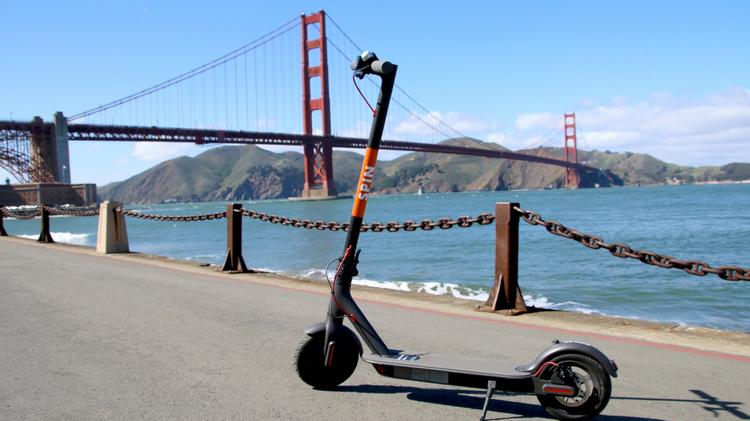 Spin Scooter and San Francisco Bay Bridge